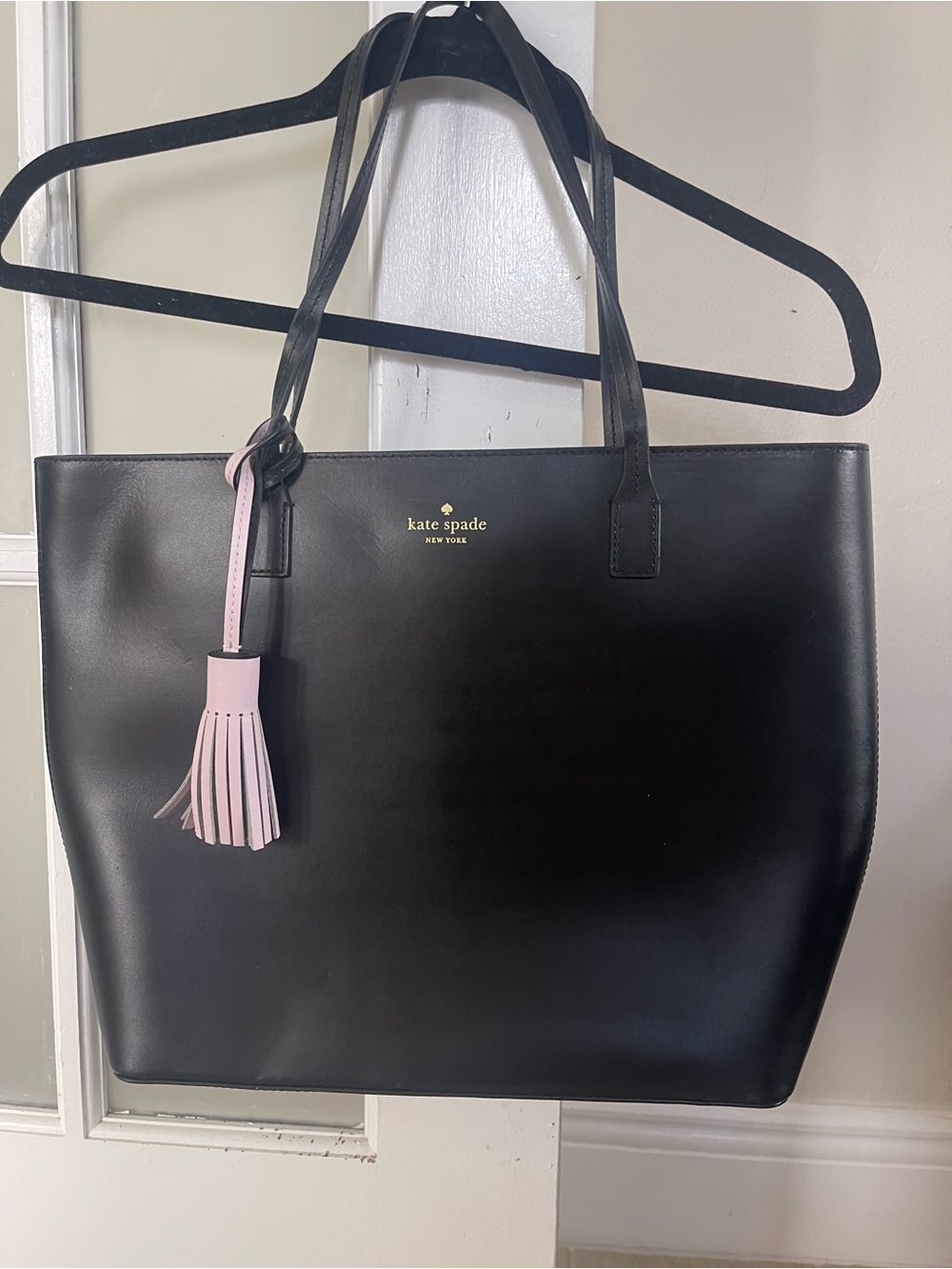 kate spade Black Leather Tote with Pink Tassel Charm